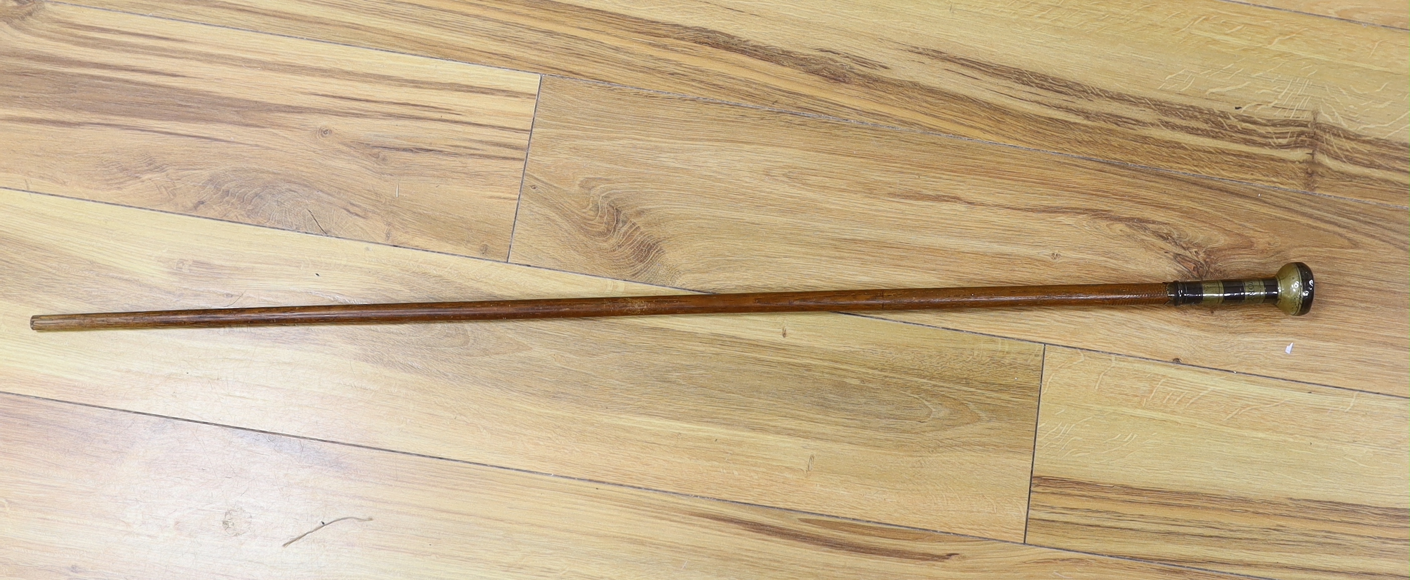 A walking cane, with engraved copper and brass handle, ‘Edmund Ivory, George King, 1741’, length 100cm